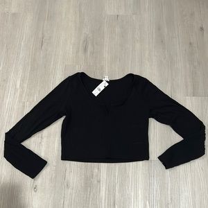 Garage cropped shirt. Women’s size large. In black. NWT